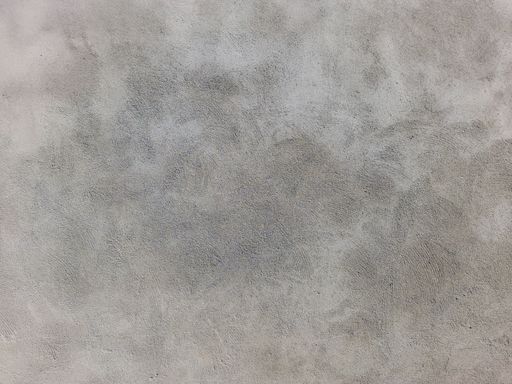 A close-up shot of a plastered wall background