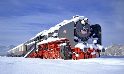 A big, old steam locomotive in winter time in Viseu de Sus, Romania