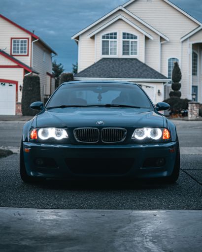 The M Power BMW 2003 M3 Laguna Seca Blue parked in a yard