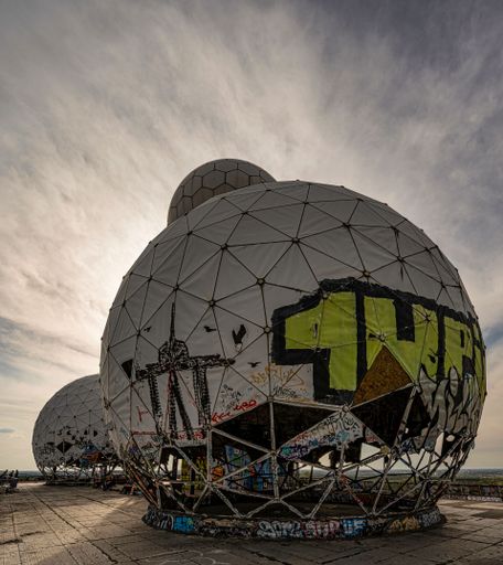 A vertical close-up shot of the NSA listening station on Teufelsberg in Berlin, Germany