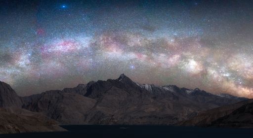 A beautiful view of the milky way and the range of mountains at night