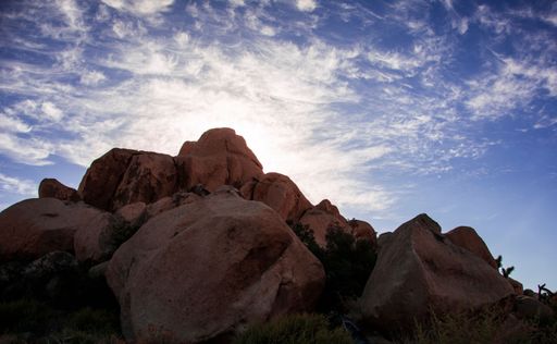 The rock formation of huge sandstone boulders under blue cloudy sky,Joshua Tree National Park,California,USA