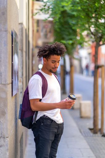 afro having a delicious coffee