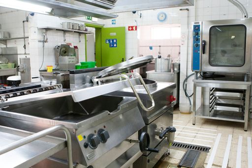 A professional kitchen of the restaurant with stainless steel equipment