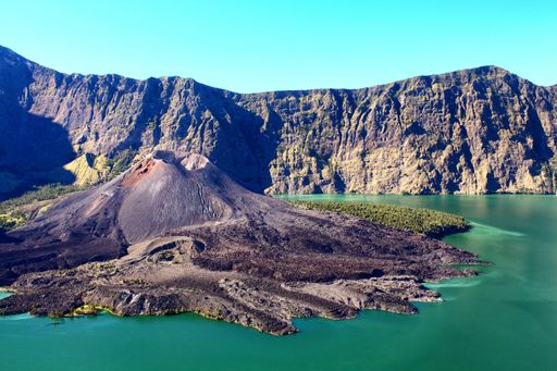A horizontal shot of Mount Rinjani near the beautiful lake in Lombok, Indonesia