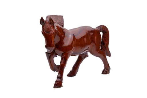 A closeup shot of a wooden horse isolated on a white background
