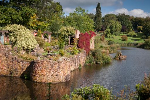 a landscape view of a large garden in an English country estate
