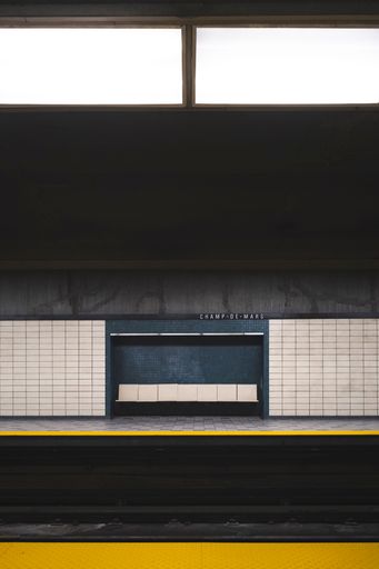 A vertical shot of empty seats at the Champ-De-Mars subway station in Montreal