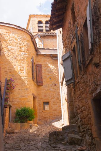 Few buildings under the sunlight in Theize, Rhone, France