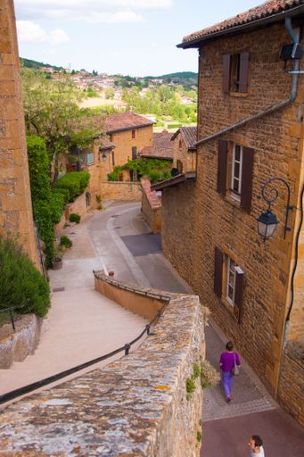 A vertical shot of a historic street in medieval style