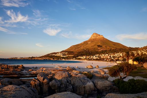 A beautiful view of Lion's Head mountain at sunset in Camps Bay, Cape Town, South Africa