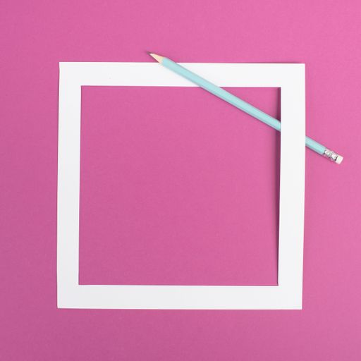 Pencils on a pink paper background, white frame with copy space for text, minimalism, creative and business concept, pastel colored