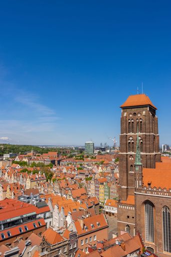 A scenic view of old town and Basilica of St. Mary under the clear sky in Gdansk, Poland