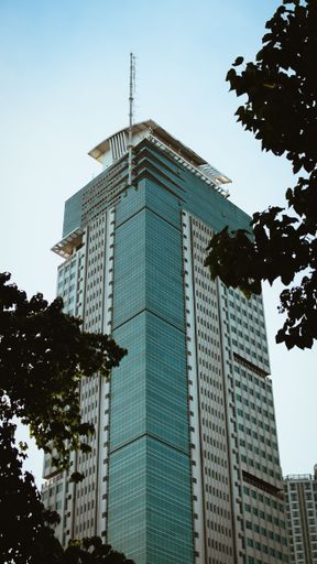 A low angle shot of a one of the stunning buildings in Ortigas Pasig City