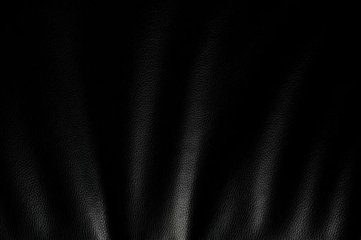 A closeup of black leather material as a background