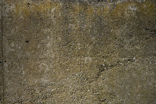 An old damaged concrete wall texture for a background