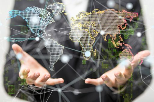A 3D rendering of a world map hovering over a man's hands