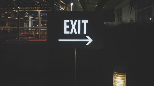 A closeup shot of a exit sign on the building