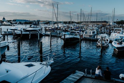 A scenic view of a port in Annapolis with boats under the blue sky, Maryland
