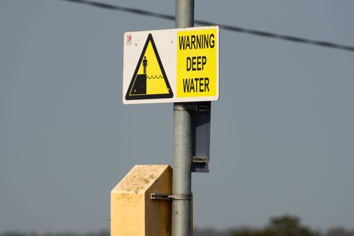 Yellow warning deep water sign outdoor in Ireland