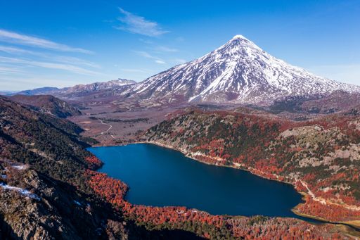 A beautiful shot of a lake surrounded by mountainous landscape