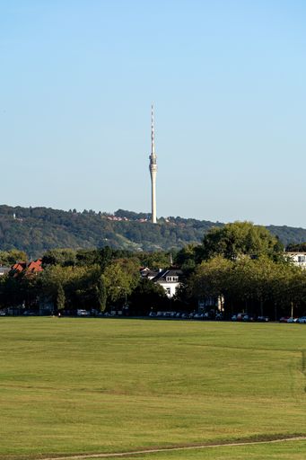 A vertical shot of television tower in the park in Dresden