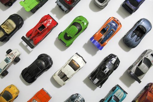 A top view shot of small colorful toy cars