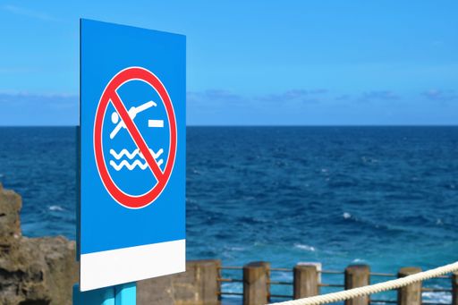 A sign that means "No Diving" at Charco Azul in La Palma, Canary Islands