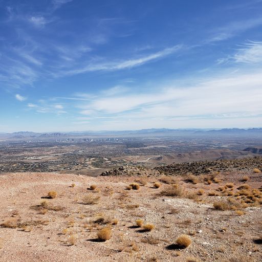 An aerial view of beautiful mountains on a sunny day