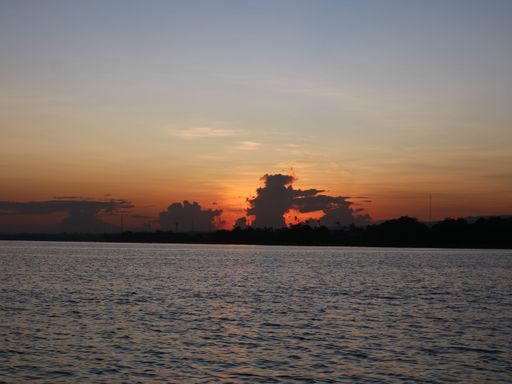 A beautiful sunset with silhouette of clouds at Lovina Beach in Bali, Indonesia