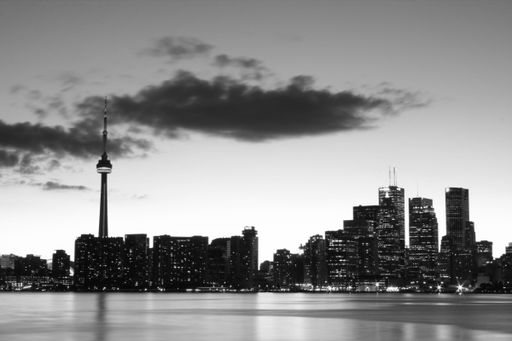 A beautiful grayscale cityscape Toronto at the riverside