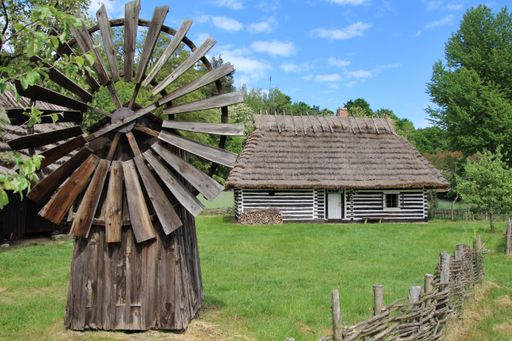 An open-air wooden museum and a windmill in Sanok, a house from Ustrobna, Poland