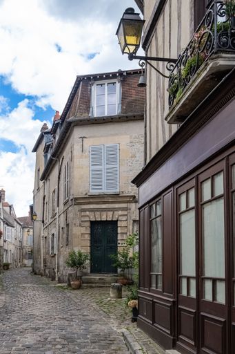 Senlis, medieval city in France, typical street with ancient houses