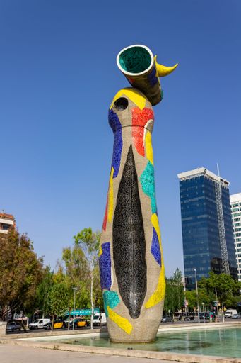 A vertical shot of a Dona i Ocell" (Woman and Bird) sculpture by Joan Miro located in parc Joan Miro, in Barcelona, Spain