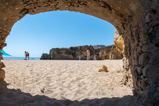 A beautiful rocky beach view in Lagos, Portugal, on a sunny day