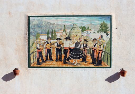 Open air wall decoration with ceramic on Plaza de los Verdiales in the Andalusian white village of Comares, in the province of Malaga