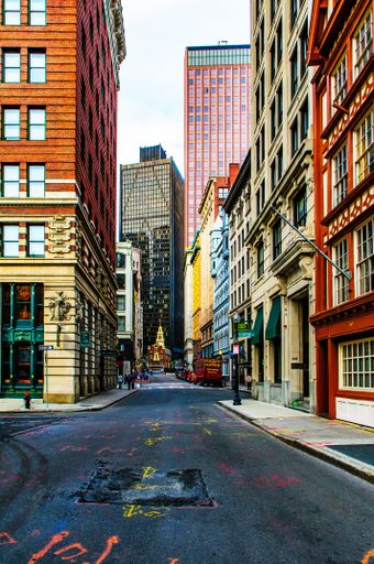 An urban landscape of a typical European street corner with coloful bulidngs
