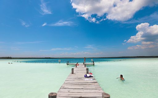 The emerald waters at Tulum's Kaan Luum Lagoon look like the colors of a postcard.