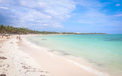 Xpu Ha Beach on Mexico's Riviera Maya has picturesque water and skies with white sand.