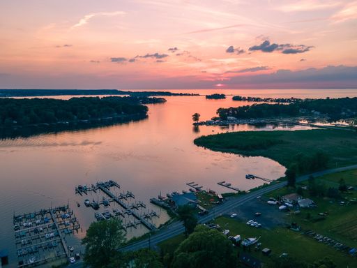 An aerial view of a beautiful sunset over Sodus Bay in New York