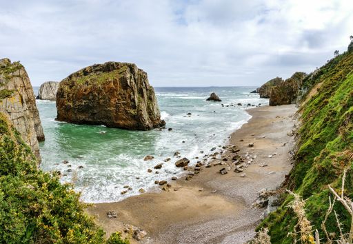 A panoramic view of the beautiful island near the seashore with a clear sky background