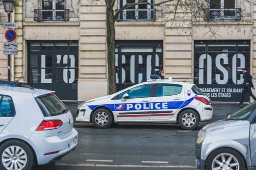French police car parked in the street. Peugeot 308 side