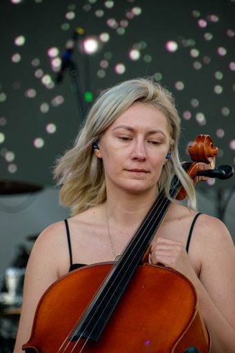 The violinist of the band of Valeria Stoica live concert at Hangariada aeronautical festival in Iasi
