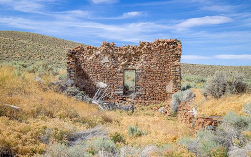 Stone ruins remain standing at the Unionville mining camp ghost town.