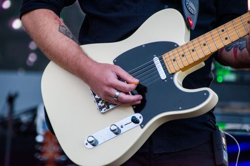 a closeup of guitar at Valeria Stoica live concert at Hangariada - aeronautical festival in Lasi, Romania