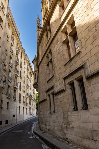 Paris, small street with the facade of the beautiful Sens hostel