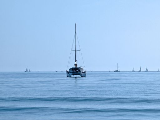 A sailboat floating on grand traverse bay