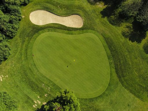 Aerial view from sand bunker at a golf course