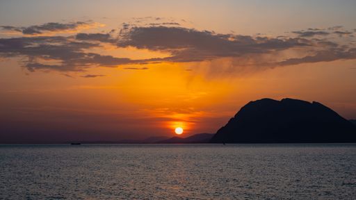 The sunset at the bay of Patras as seen from the city's park