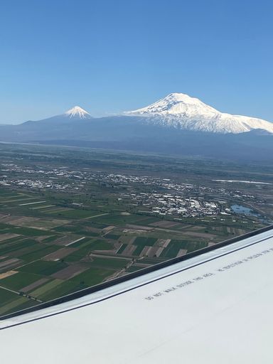 A vertical view of the Ararat mountain from a plane window